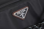 Prada Milano logo patch on brown leather trim