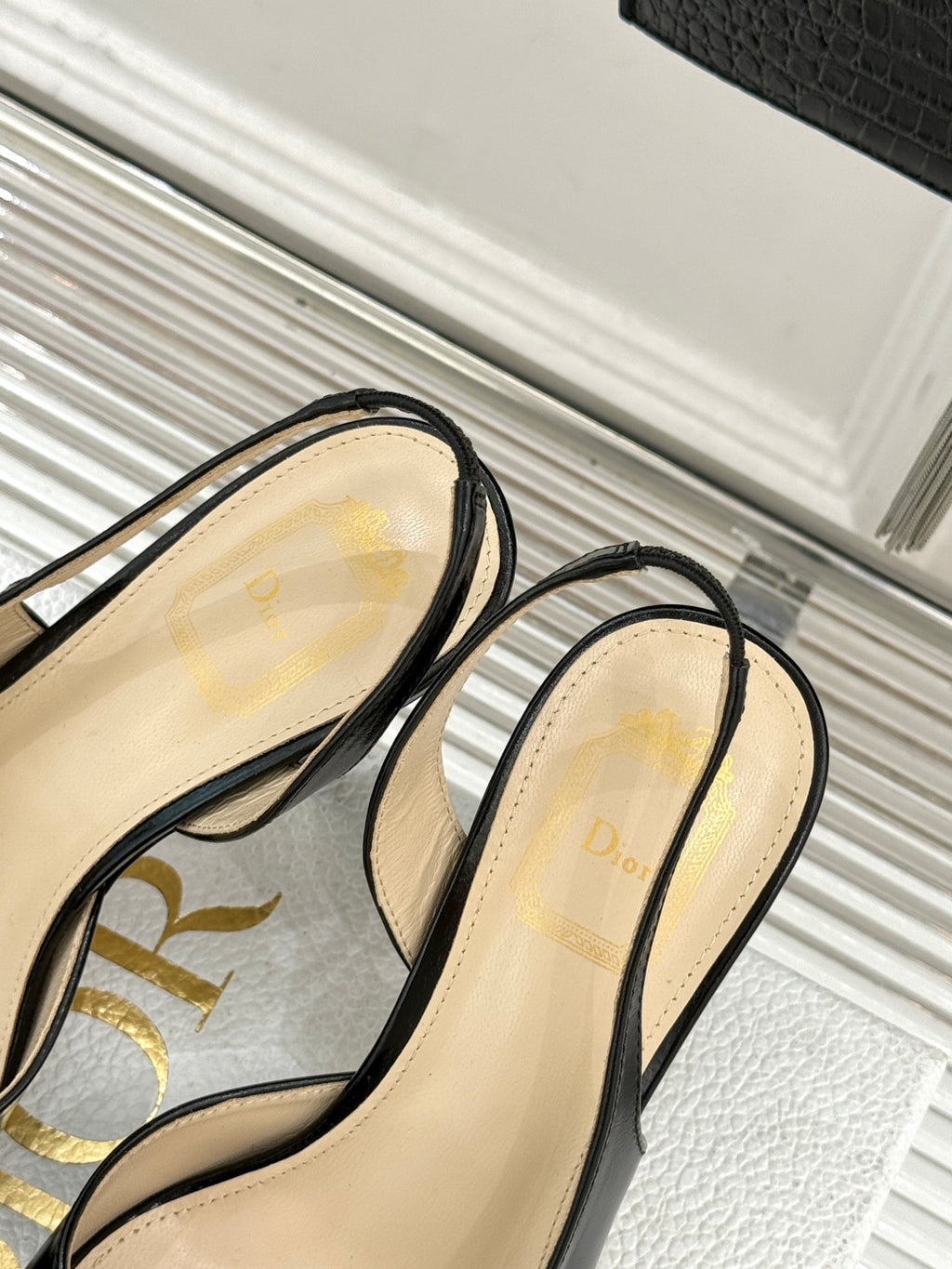 Dior heeled sandals with beige insoles and black slingback straps
