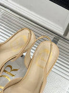 Beige slingback sandal heels with Dior logo on footbed