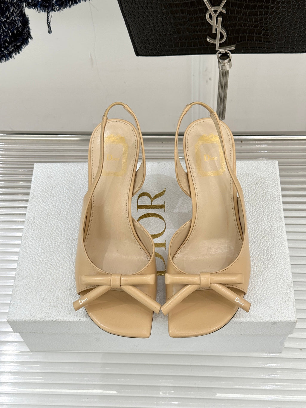 Beige open-toe heeled sandals with knotted ankle ties and Dior logo insole