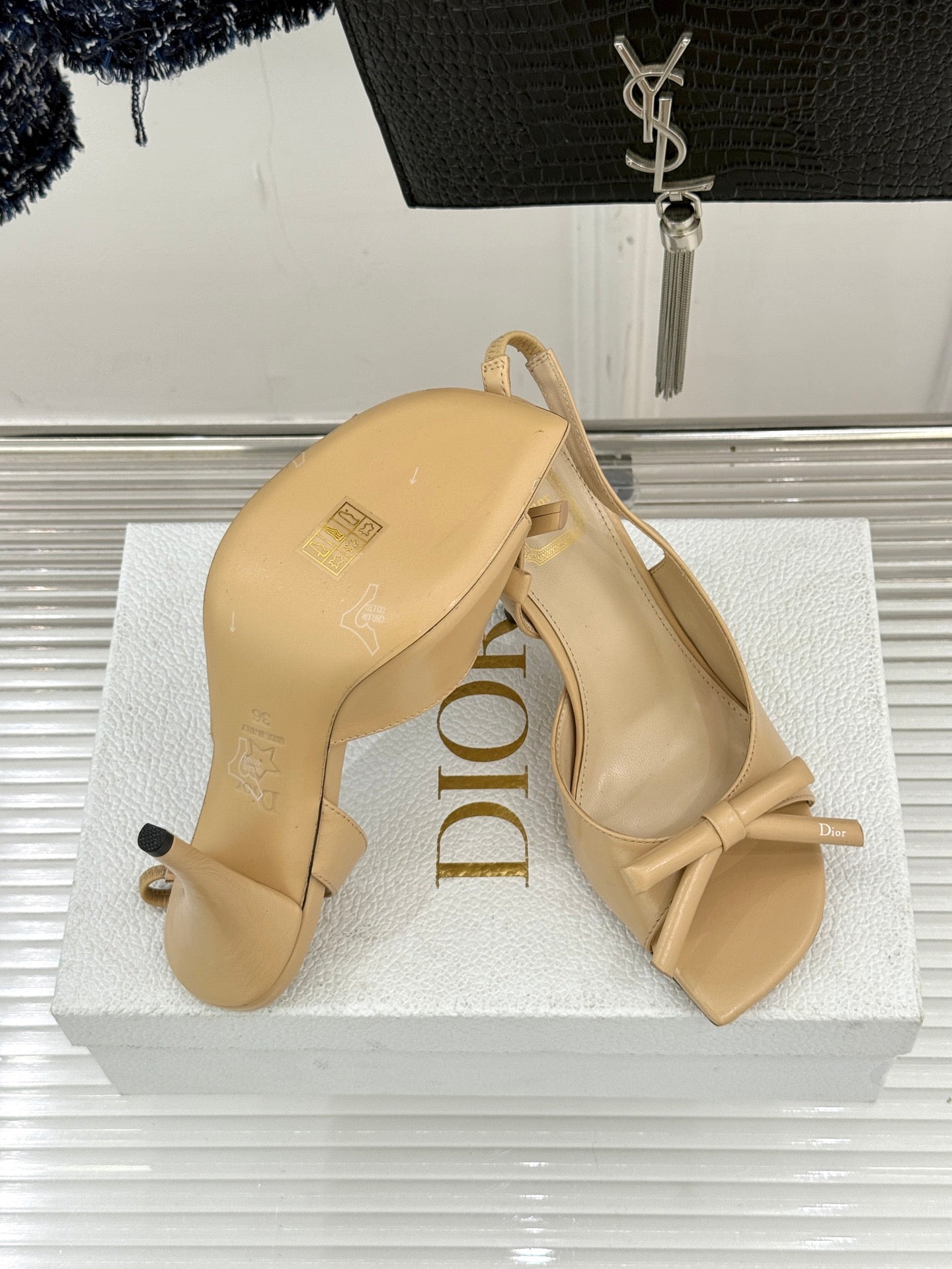 Beige open-toe heeled sandals with ankle tie bows and Dior logo insole