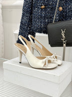 Dior ladies high-heel sandals, white leather with bow straps and slim heel