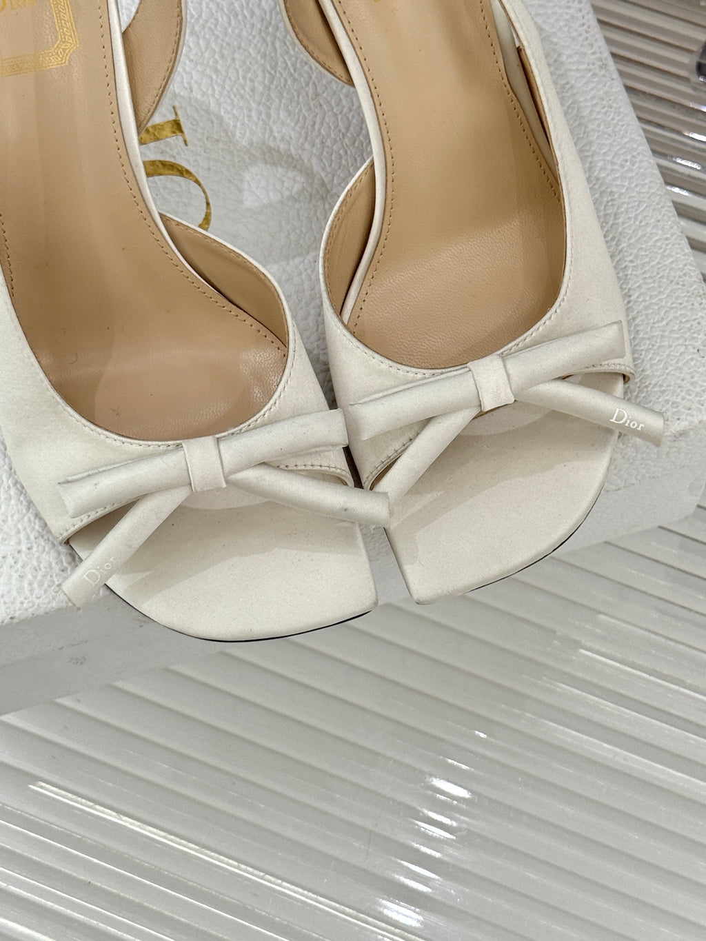 Dior ladies white open-toe sandals with bow knot straps and beige interior