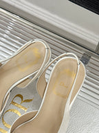 Dior ladies sandals close-up, white slingback with branded insole and trim