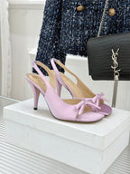 Lavender slingback pumps with bow detail and pointed toe, stiletto heel