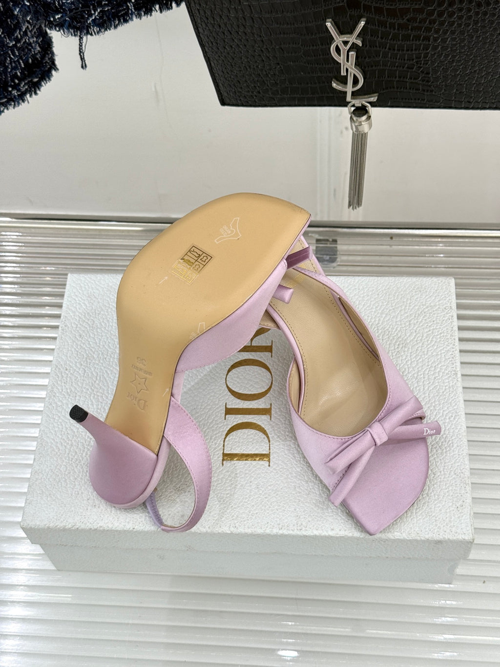Pair of lilac Dior slingback pumps with bow and stiletto heels
