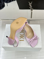 Pair of lilac Dior slingback pumps with bow and stiletto heels