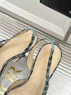 Dior blue plaid slingback heels with Dior logo on insole, close-up