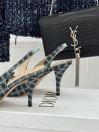 Dior blue plaid slingback heels with bow, side profile on display