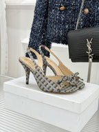 Women’s heeled slingback sandals with plaid fabric uppers and slim stiletto heels