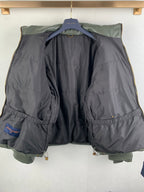 Long hooded puffer jacket with two-tone dark and olive-gray body and elastic hem