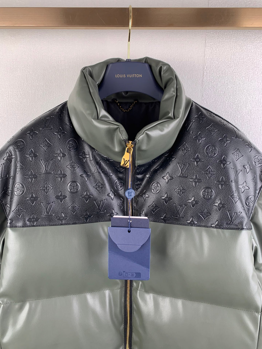 Louis Vuitton two-tone puffer jacket, front zip and stand collar with tags