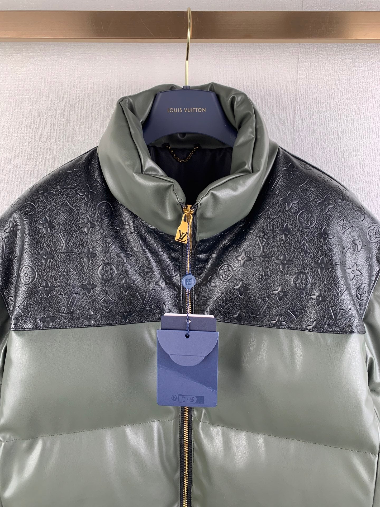 Louis Vuitton two-tone puffer jacket, front zip and stand collar with tags