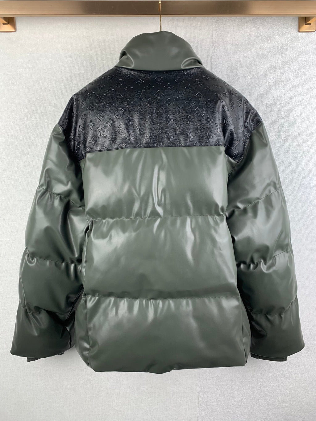 Louis Vuitton two-tone puffer jacket, back view with monogram upper panel