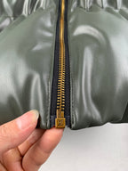Louis Vuitton front zipper with gold LV pull on olive puffer