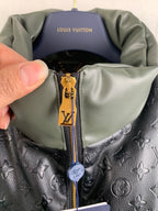 Louis Vuitton zip pull with LV logo on two-tone puffer jacket