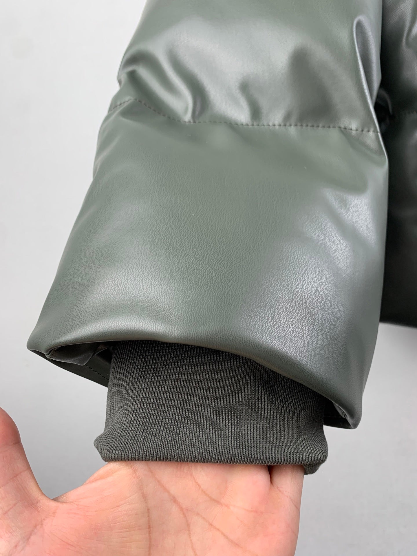 Louis Vuitton puffer jacket sleeve with ribbed gray cuff