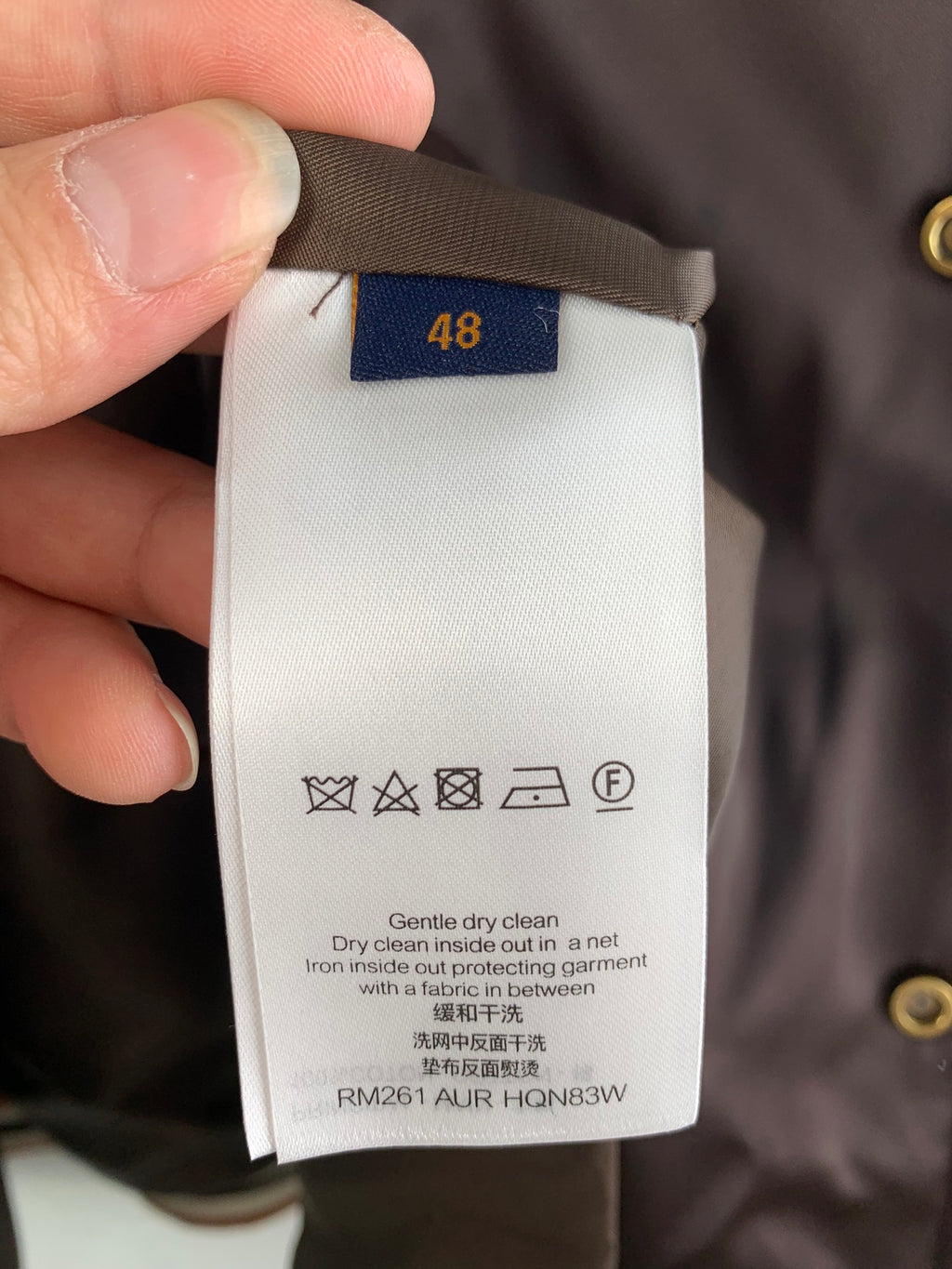 Jacket size 48 care label with wash and drying symbols