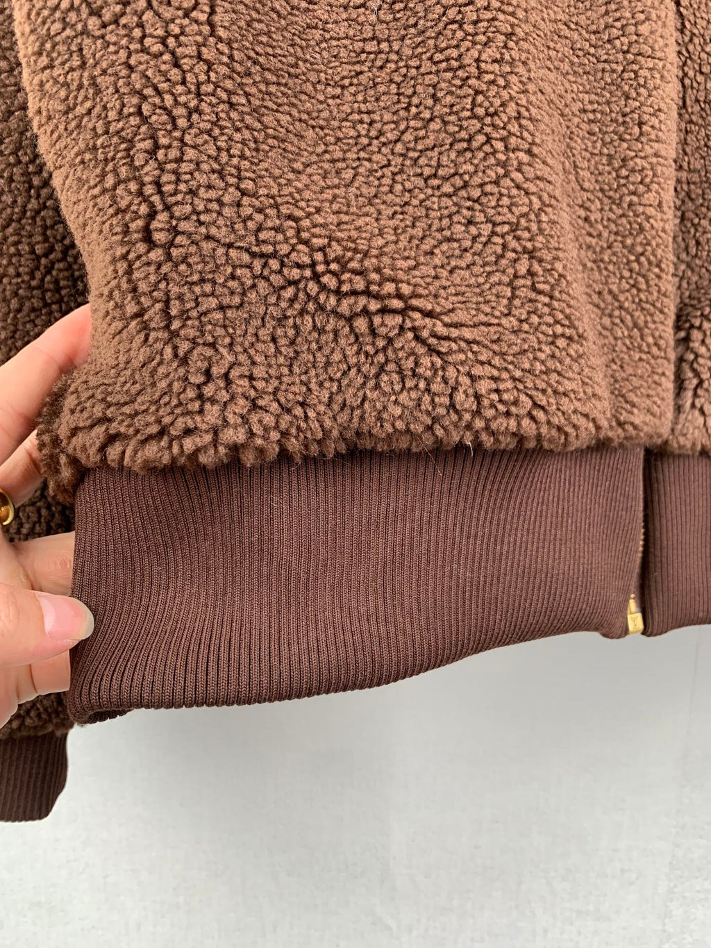 Louis Vuitton long brown teddy-fleece hem with ribbed cuff and gold zipper tape