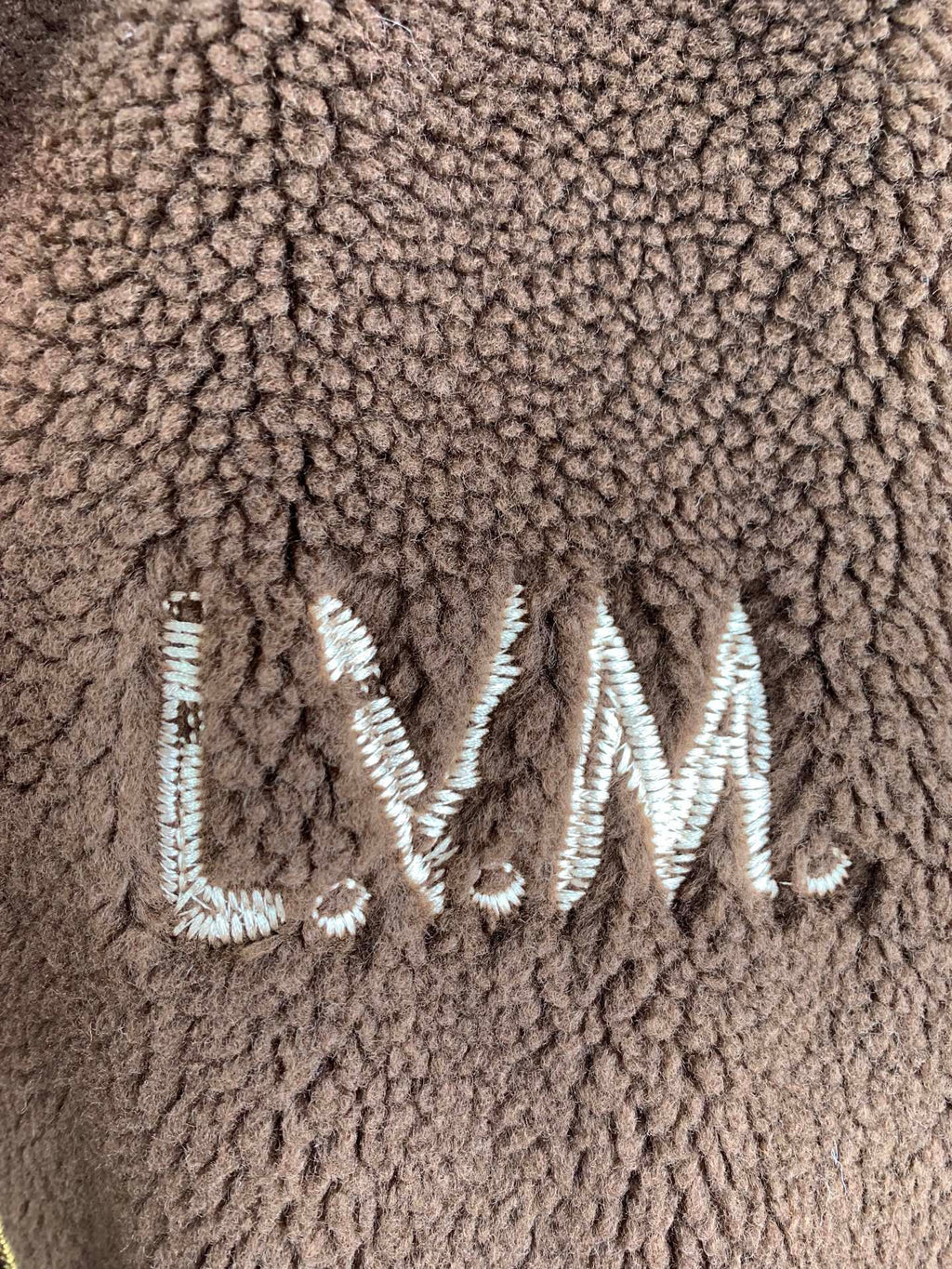Louis Vuitton long brown teddy-fleece jacket front with white LVM logo embroidery