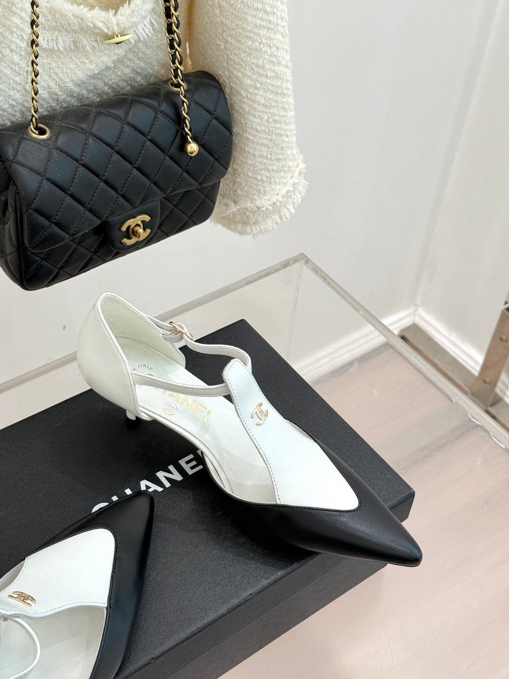 Chanel ladies slingback heels, white pointed toe with black heel tip and gold logo