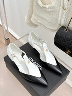 Chanel ladies slingback heels, white leather with black pointed toe accents