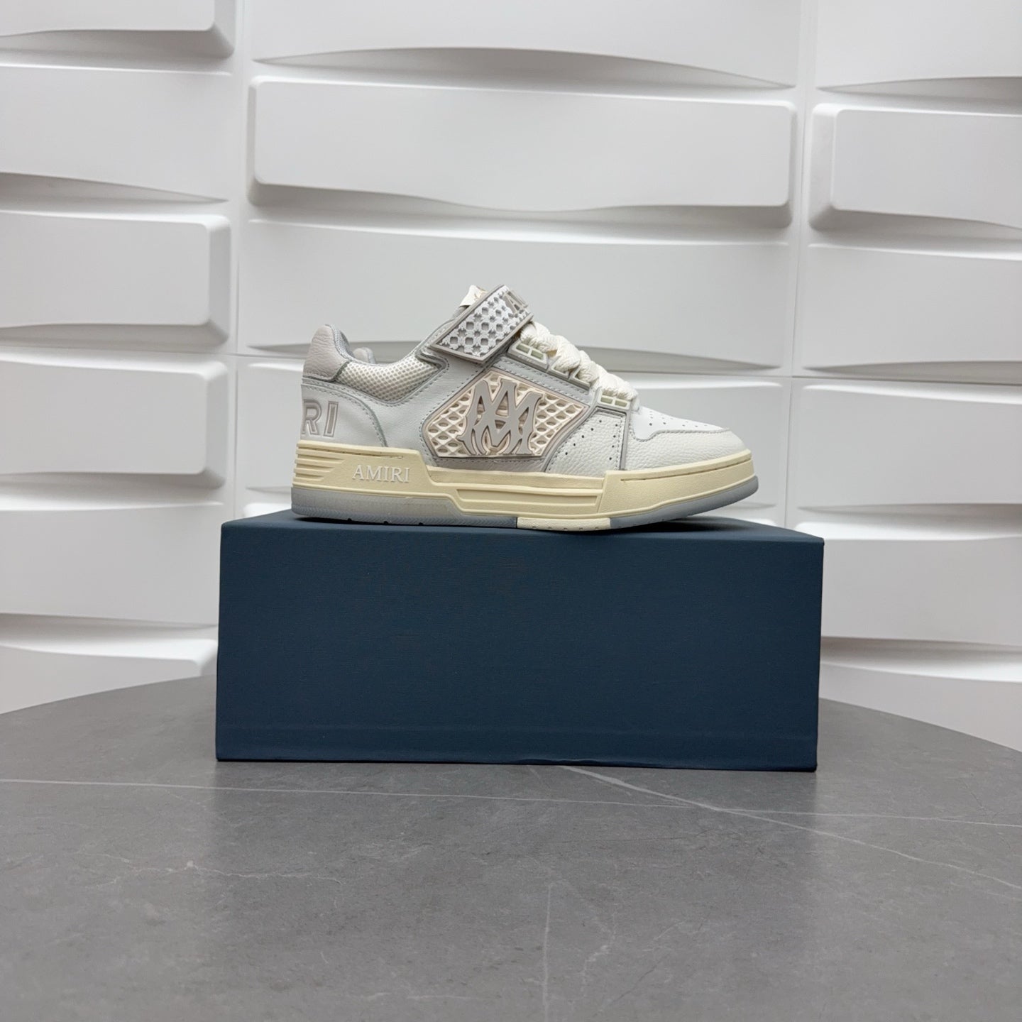 Amiri low-top sneakers in white with studded side strap and light sole