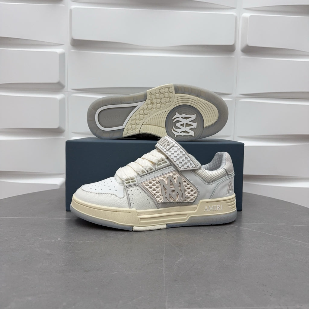 Amiri low-top sneakers with visible outsole tread, white upper and beige sole