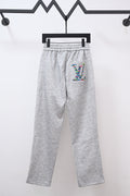 Gray sweatpants with drawstring, elastic waist, and colorful LV logo patch