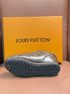 Louis Vuitton monogram sneaker outsole with deep tread pattern, dark rubber base