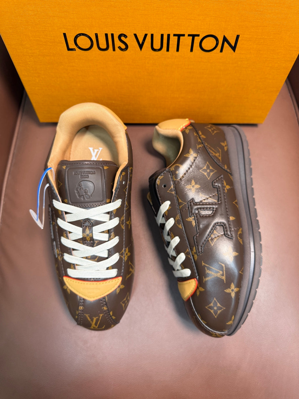 Louis Vuitton monogram low-top sneakers, white laces and side strap detail