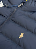 Ralph Lauren puffer jacket chest area, navy blue with gold polo logo