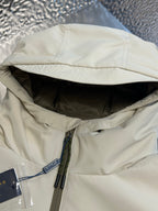 Light beige hood lining with mesh trim and visible zipper and pulls