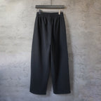 Black Balenciaga track pants with elastic waistband and loose wide fit