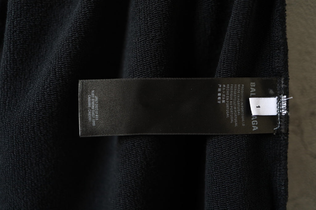 Black pants with internal care label near the waistband