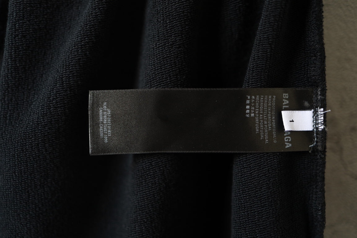 Black pants with internal care label near the waistband