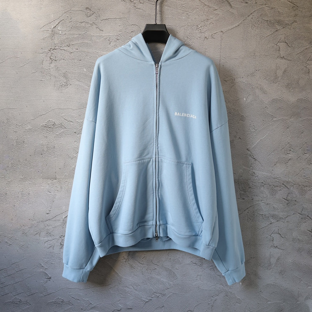 Balenciaga light blue zip-up hoodie with hood and front pockets