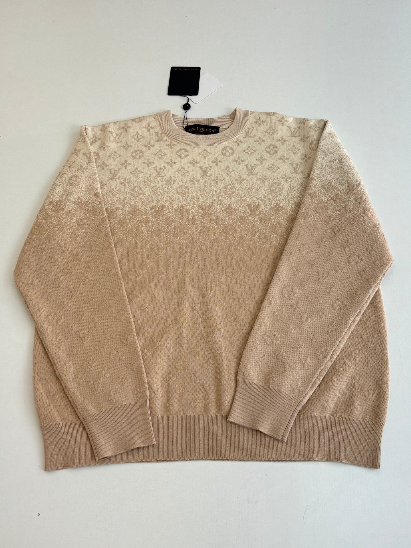 Light beige monogram crewneck sweater, front flat lay
