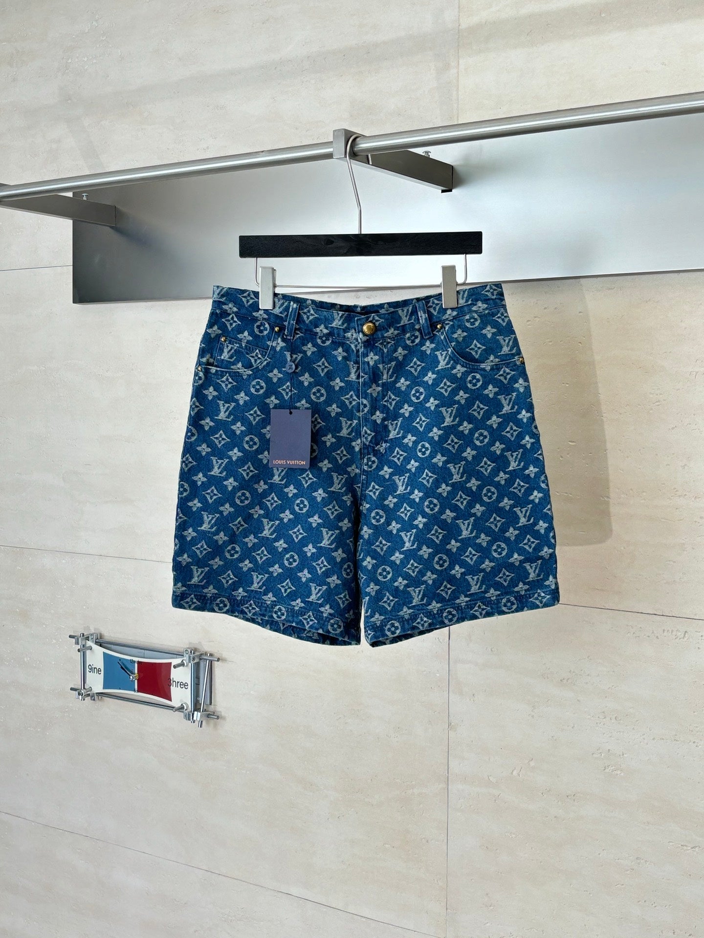 Louis Vuitton monogram denim shorts, blue, straight cut with belt loops and zip fly.