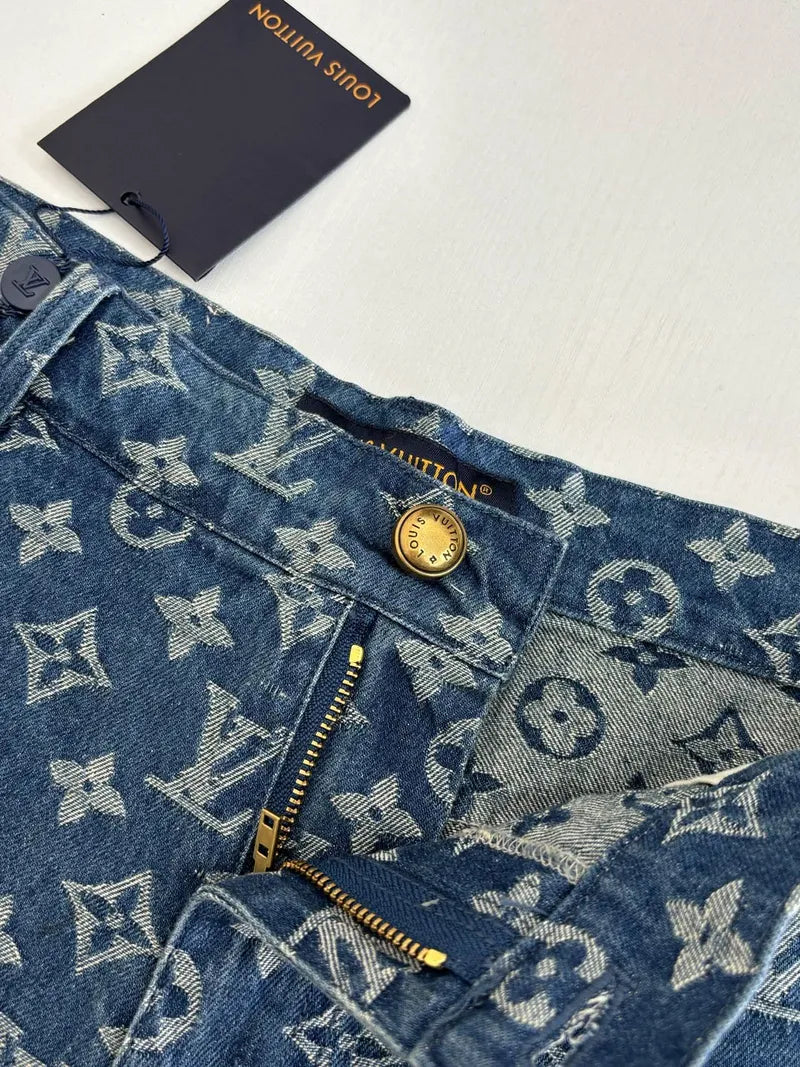 Louis Vuitton monogram denim shorts close-up, front zip with gold-tone button