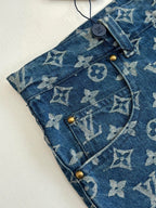 Louis Vuitton blue monogram denim shorts detail, button fly and belt loops.
