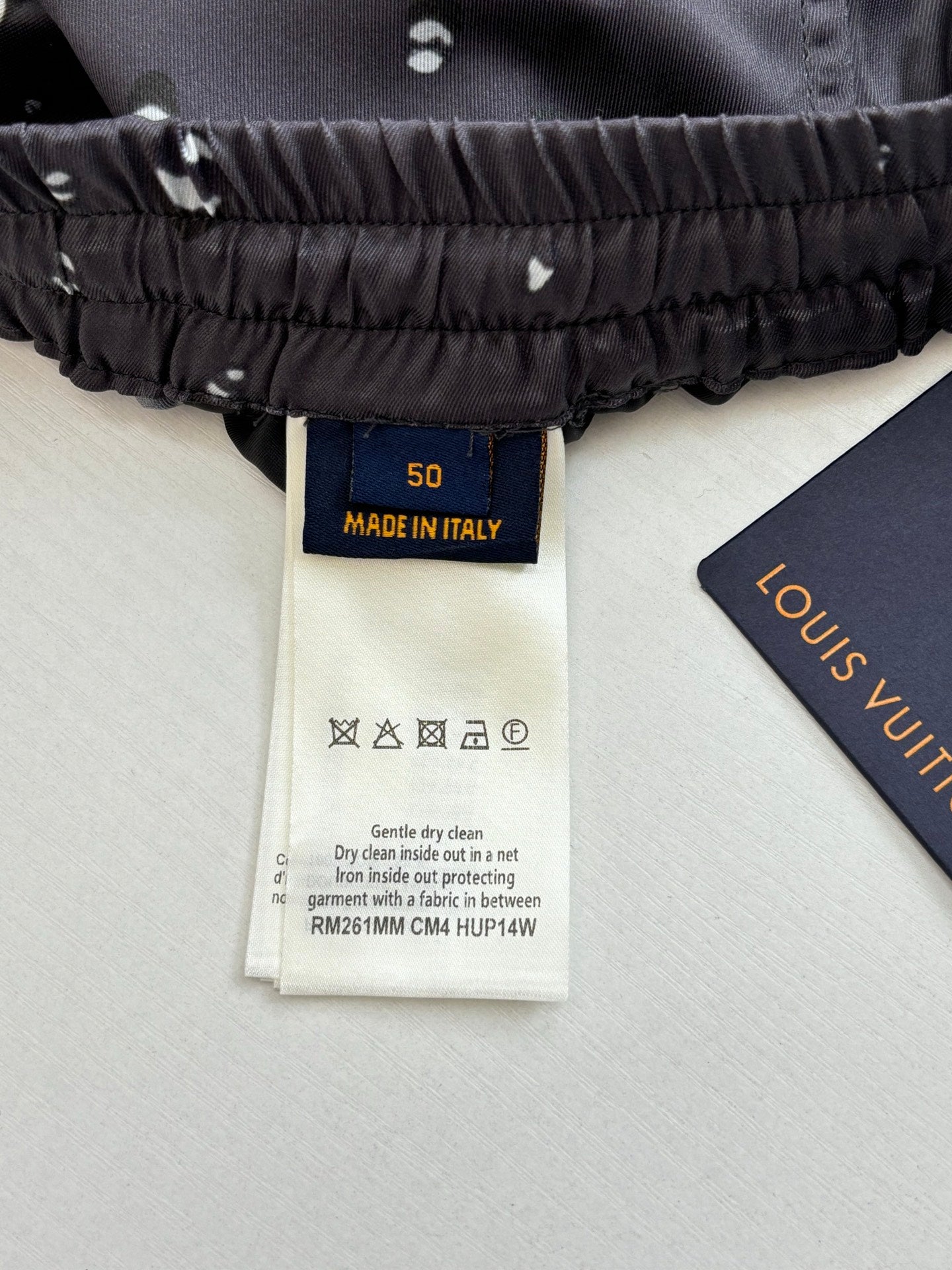 Louis Vuitton black elastic-waist shorts with interior care label