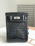 Hermes dark crocodile-embossed leather handbag with top flap and silver clasp