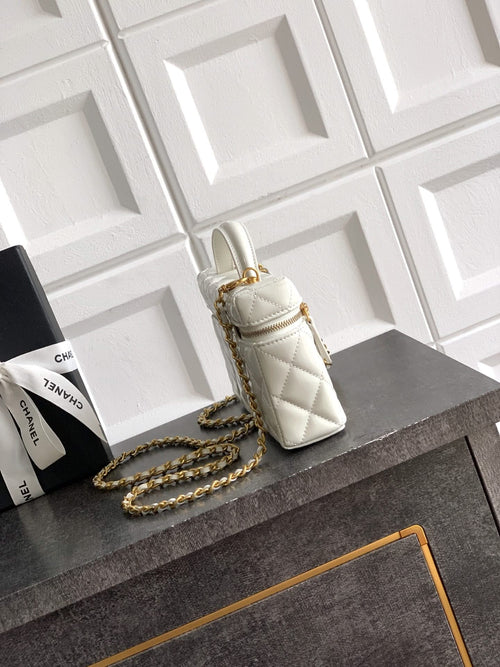 Chanel mini quilted handbag in light cream with chain strap and gold clasp