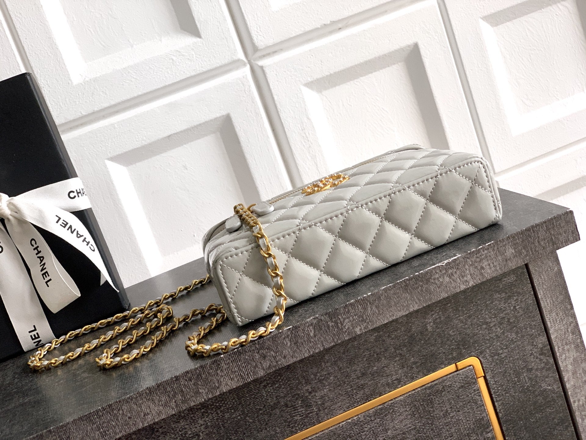 Chanel quilted flap bag, light silver-gray, gold-tone chain strap and turn-lock