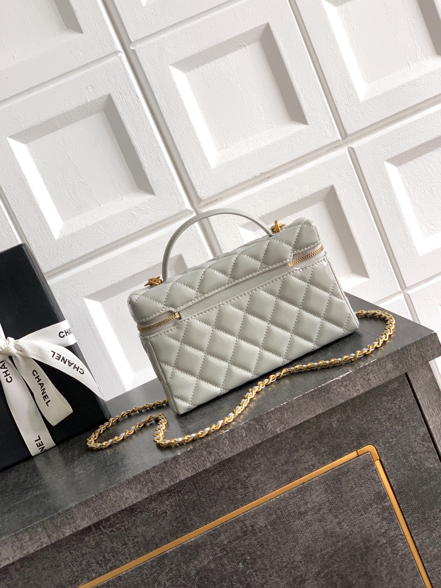 Chanel quilted mini top-handle bag, light silver-gray, gold-tone chain strap