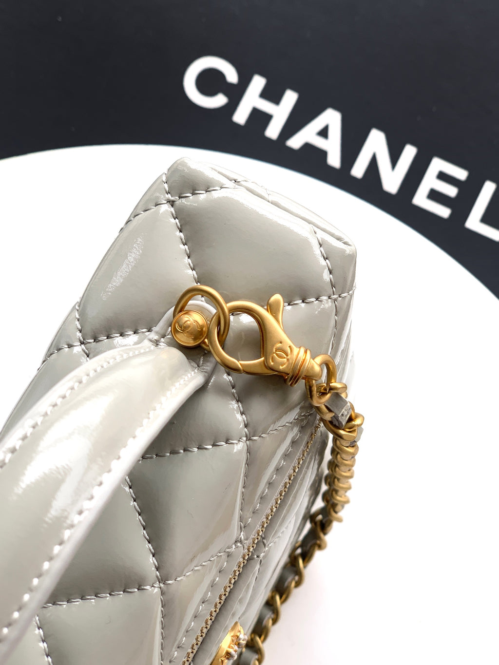 Chanel quilted top frame, light silver-gray, gold-tone CC clasp and chain