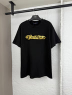 Louis Vuitton black short-sleeve T-shirt with gold embroidered “Quiltn”-style logo on chest