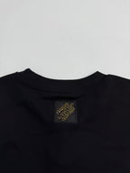 Louis Vuitton black short-sleeve T-shirt with square neck label at collar center