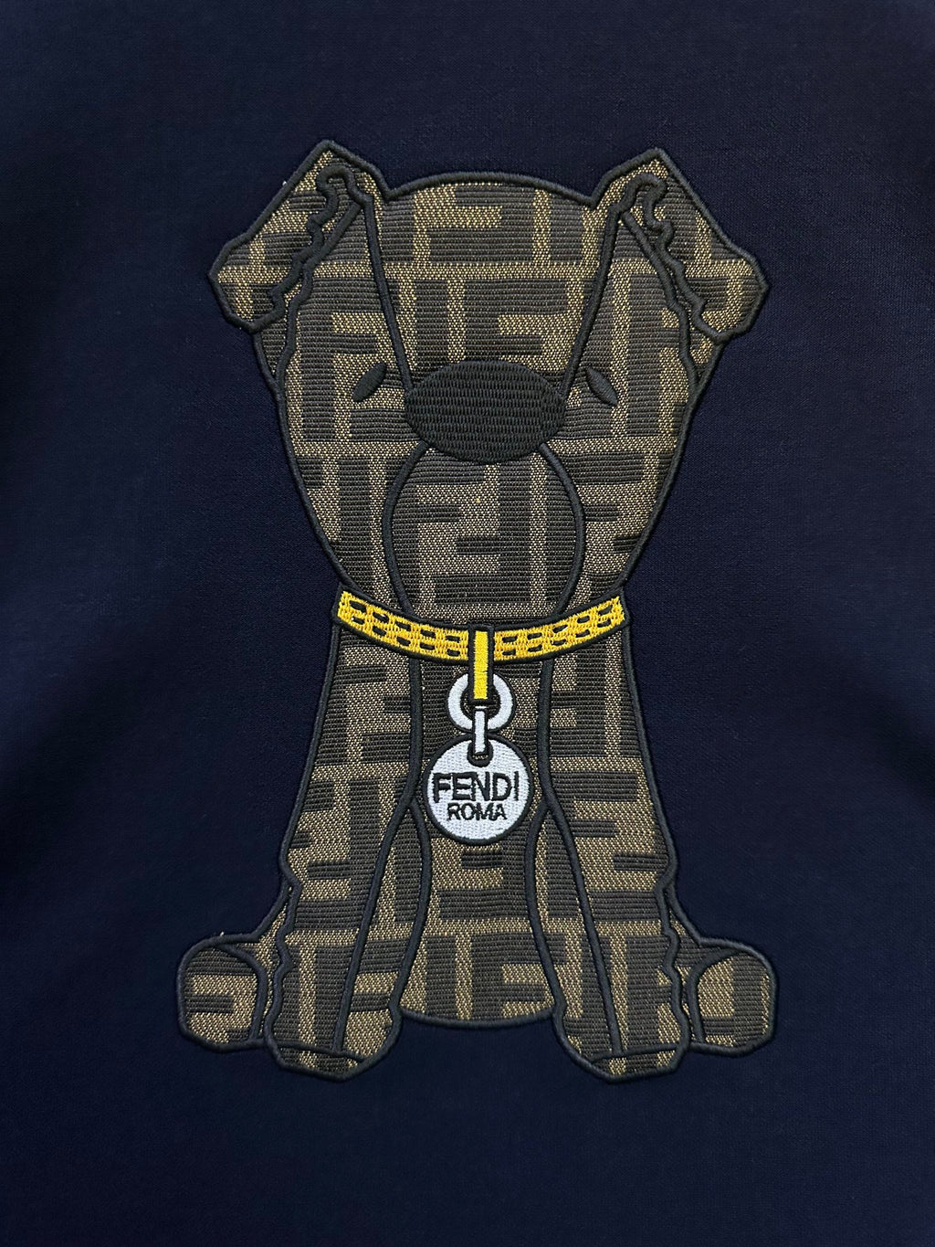 Dark navy T-shirt with embroidered teddy face graphic and FENDI Roma text